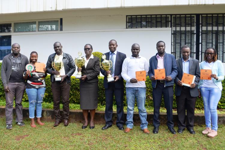 Group photo of NITF participants, the Principal CAVS and the trophies/prizes won.